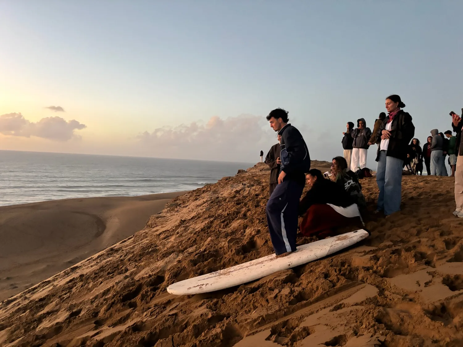 A rider sliding down a Timlalin dune