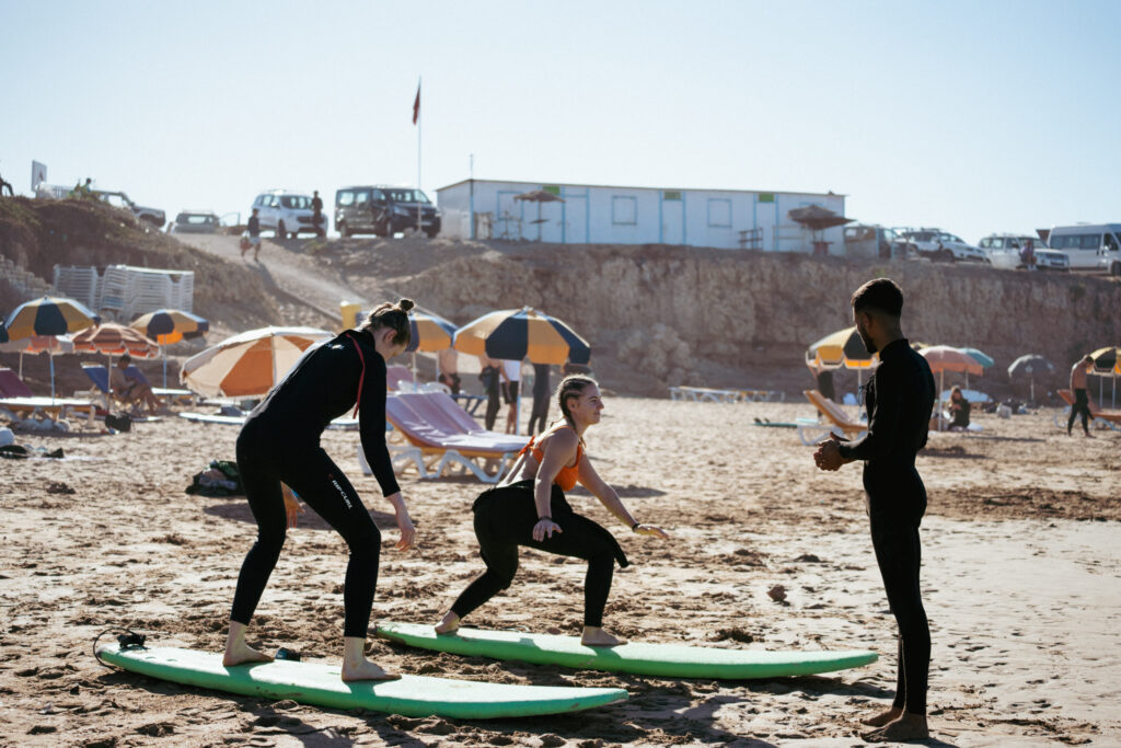 Surf instructors teaching at Surf Camp Taghazout