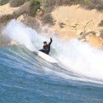 Surfer riding a perfect wave at Anchor Point, Taghazout