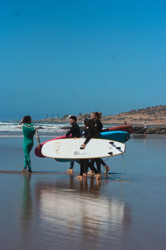 Surf camp in Taghazout, Morocco, offering surfing lessons and adventure activities for all skill levels.