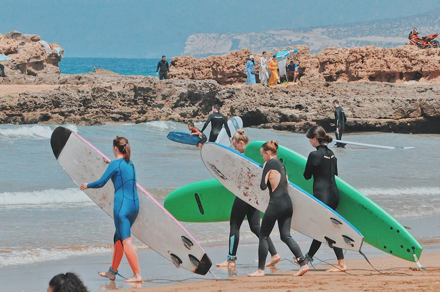 group of people surfing in taghazout