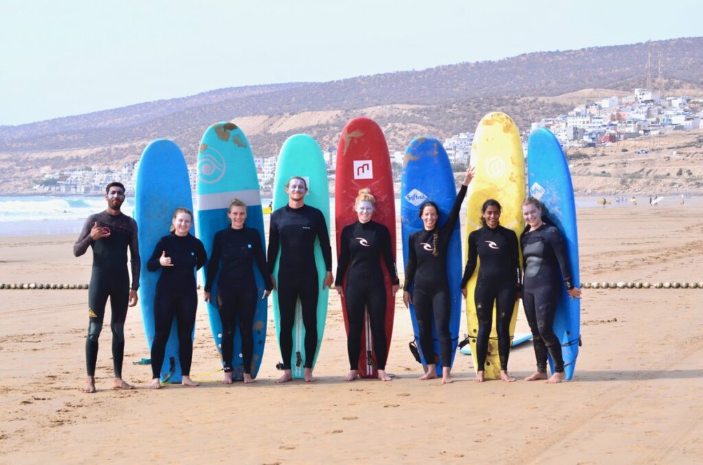 group of people surfing in taghazout