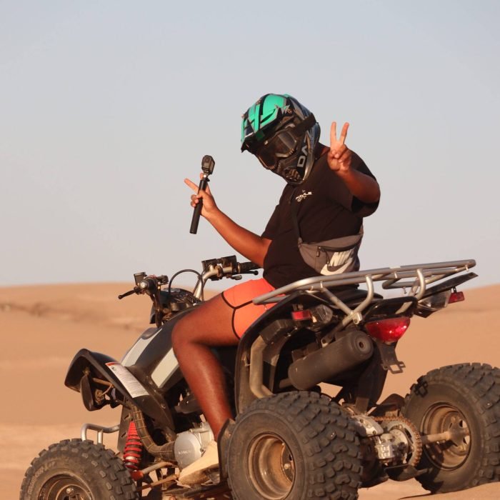 Rider enjoying Quad Bike Experience Taghazout through desert terrain